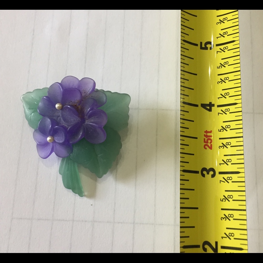 Avon floral pin.